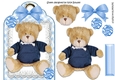 Lovely teddy in a blue jumper on lace with bow