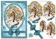 Lovely tree in the snow with blue poinsettias bracket pyramids