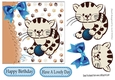 cute kitten playing with ball of wool with blue bow 7x7