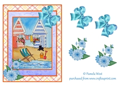 A5 beach scene with beach huts, deckchair, bucket and spade and black cat. Card topper with decoupage