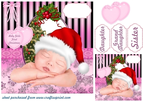 Baby girls first Christmas card front