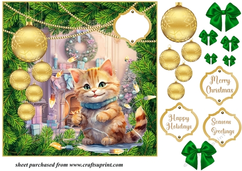 Christmas kitten with hanging baubles card front 1