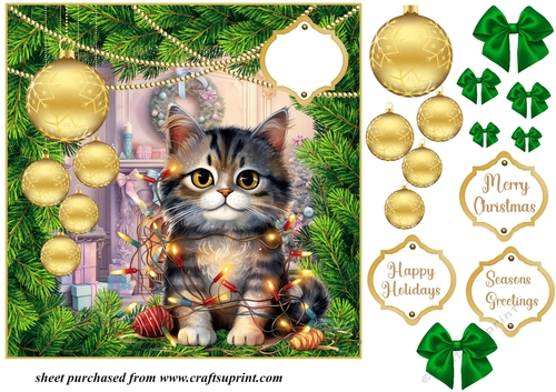 Christmas kitten with hanging baubles card front 11