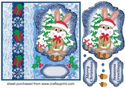 Blue Christmas present rabbit card front