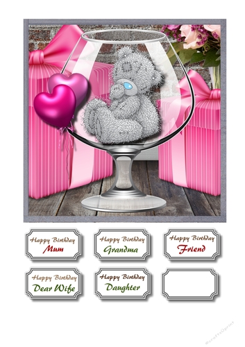 Tatty teddy in brandy glass with gifts