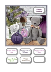 Teddy with purple accessories