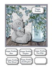 Blue flowers with tatty teddy