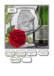 Tatty teddy in glass with rose