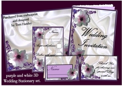 white and purple wedding stationary