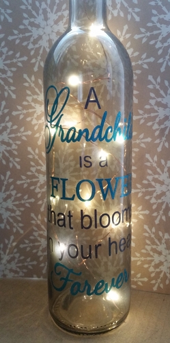 A Grandchild is a  Flower that will bloom ...  - Wine Bottle, light block decal. Easy Weed