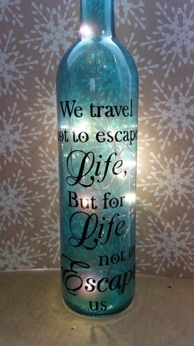 We travel not to escape life...  - Wine Bottle, light block decal. Easy Weed