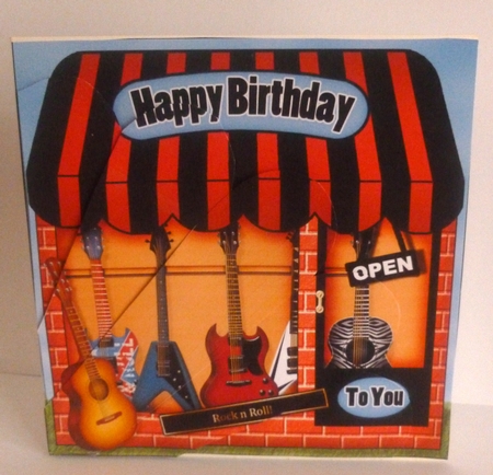 The Little Guitars & Music Shop Fan Pyramage Topper by Nicky Thorne