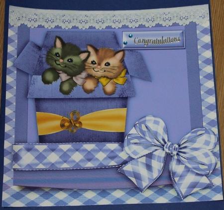 Little Kitties in a Box with Purple Bow by Carmelina Borg Cuschieri