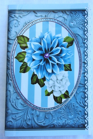 pretty blue and white flowers on oval stripe toppers by Sharon Wilson