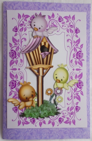 Cute Little Birds in a Birdhouse by Sharon Wilson