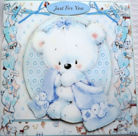 Cute Teddy With his Blue Blanket by Sharon Wilson