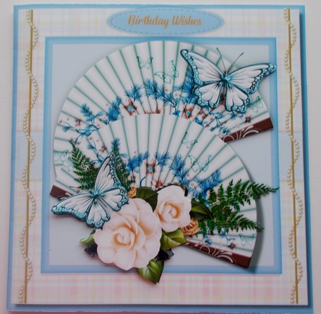 Beautiful Blue Butterflys and Cream Magnolias by Sharon Wilson
