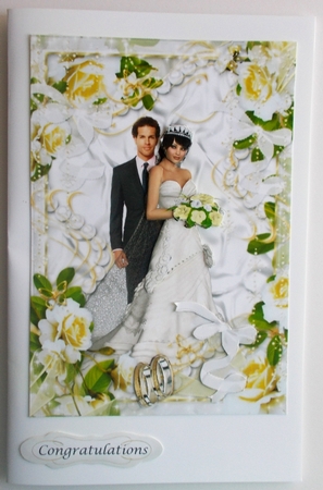 Wedding Couple 3 in white roses. ribbons & pearls frame by Sharon Wilson