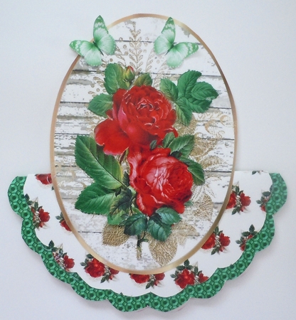 Two Pretty red roses on white washed wood oval toppers by Sharon Wilson