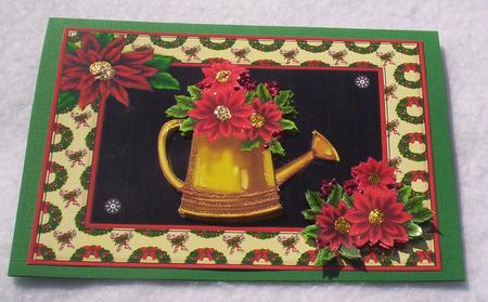 Glittery Poinsettia in a Golden Watering Can by Sharon Wilson