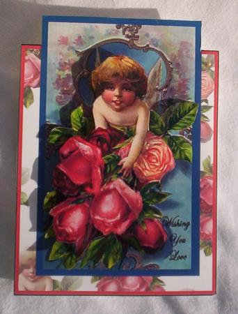 Floral Cupid Over the Edge by Sharon Wilson