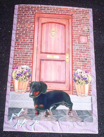 Miniature Dachshund on a Door Step by Sharon Wilson