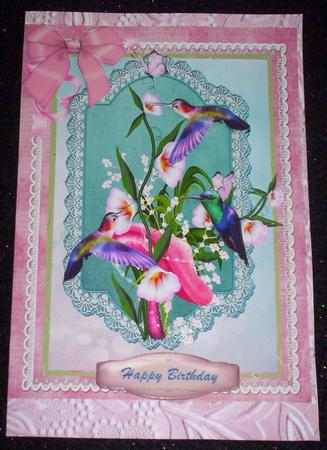 Beautiful Humming Birds on Flowers by Sharon Wilson