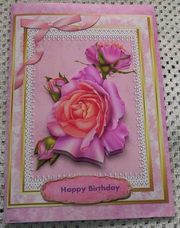 Beautiful Pink/orange Roses on Lace  by Sharon Wilson