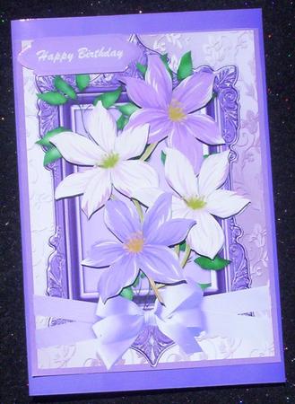 Beautiful Clematus Flowers in Lilac  by Sharon Wilson
