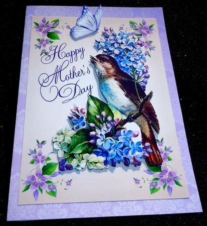 Pretty Bird with Flowers for Mothers Day by Sharon Wilson
