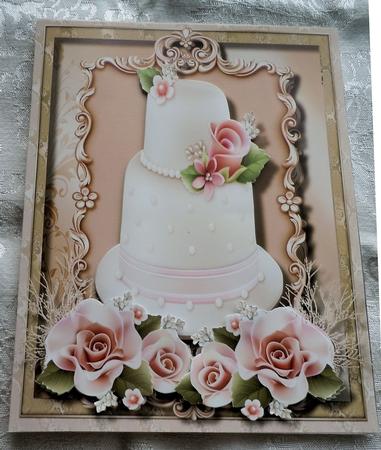 Beautiful Wedding Cake and Pink Roses  by Sharon Wilson