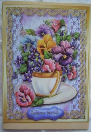 Lovely Winter Pansys in a Tea Cup. by Sharon Wilson