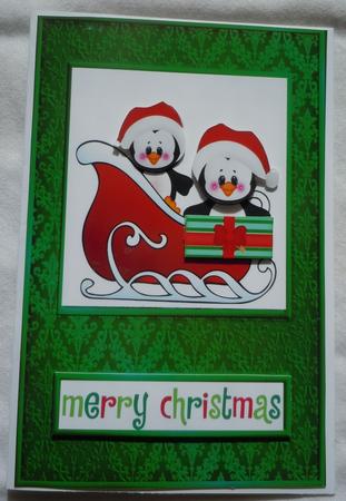 Penguins Sleigh Ride by Sharon Wilson