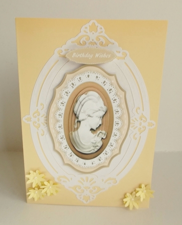 Beautiful Buff Cameo on lace Mat by Shirley Thompson
