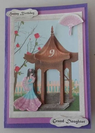 Geisha Girl in Garden with Pagoda by Susan Doyle