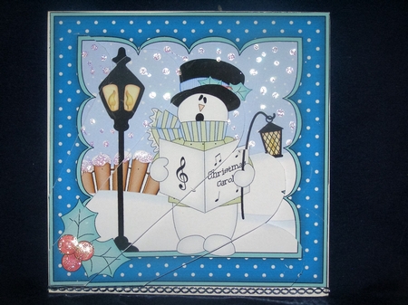 Christmas Snowman Rio goes Carol Singing Fan Pyramage Topper by Margaret Nichol