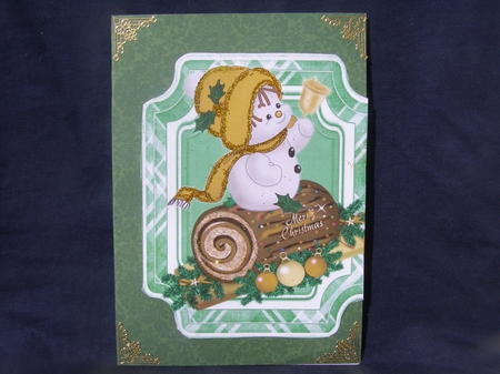 Christmas log with holly and cute snowman in gold folded card by Margaret Nichol