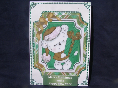 Cute little white bear  in santa hat with green present folded quick card by Margaret Nichol
