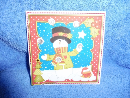 Christmas Snowman Rio has a Snowball Fight Fan Pyramage Topper by Margaret Nichol
