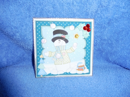 Christmas Snowman Rio has a Snowball Fight Fan Pyramage Topper by Margaret Nichol