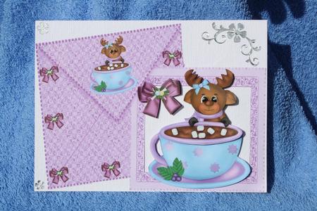 Reindeer with Choc in Teacup, on Card & Envelope by Margaret Nichol