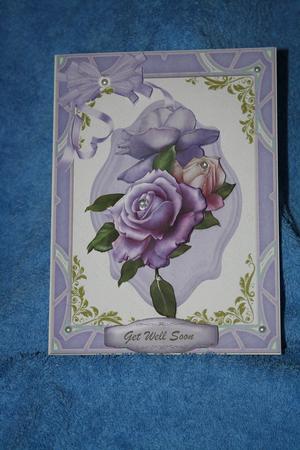 Beautiful Roses on a Lilac Mat by Margaret Nichol