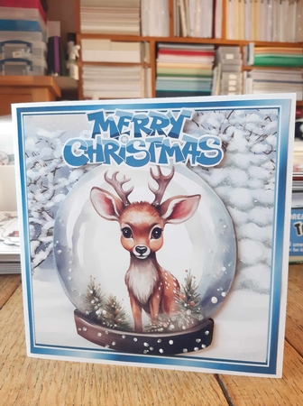 Lovely Reindeer With Trees In A Snow Globe 8x8 by Ann Davies