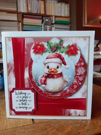 Red Christmas duckling card front  by Ann Davies
