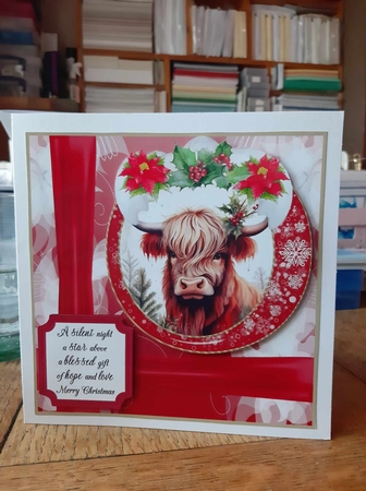 Red Christmas Highland cow card front  by Ann Davies