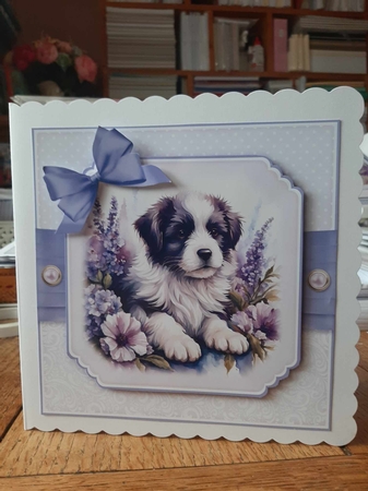 Puppy in Flowers No.2 by Ann Davies