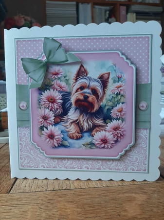 Puppy in Flowers No.9 by Ann Davies