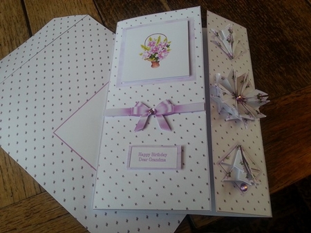Beautiful 7 x 5 in pink lily card with tea bag folded medallion and matching envelope. by Ann Davies