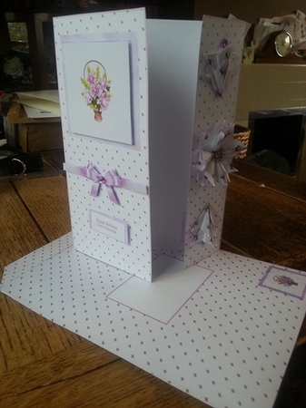 Beautiful 7 x 5 in pink lily card with tea bag folded medallion and matching envelope. by Ann Davies