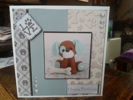 Dogs leave paw prints on your heart  by Ann Davies